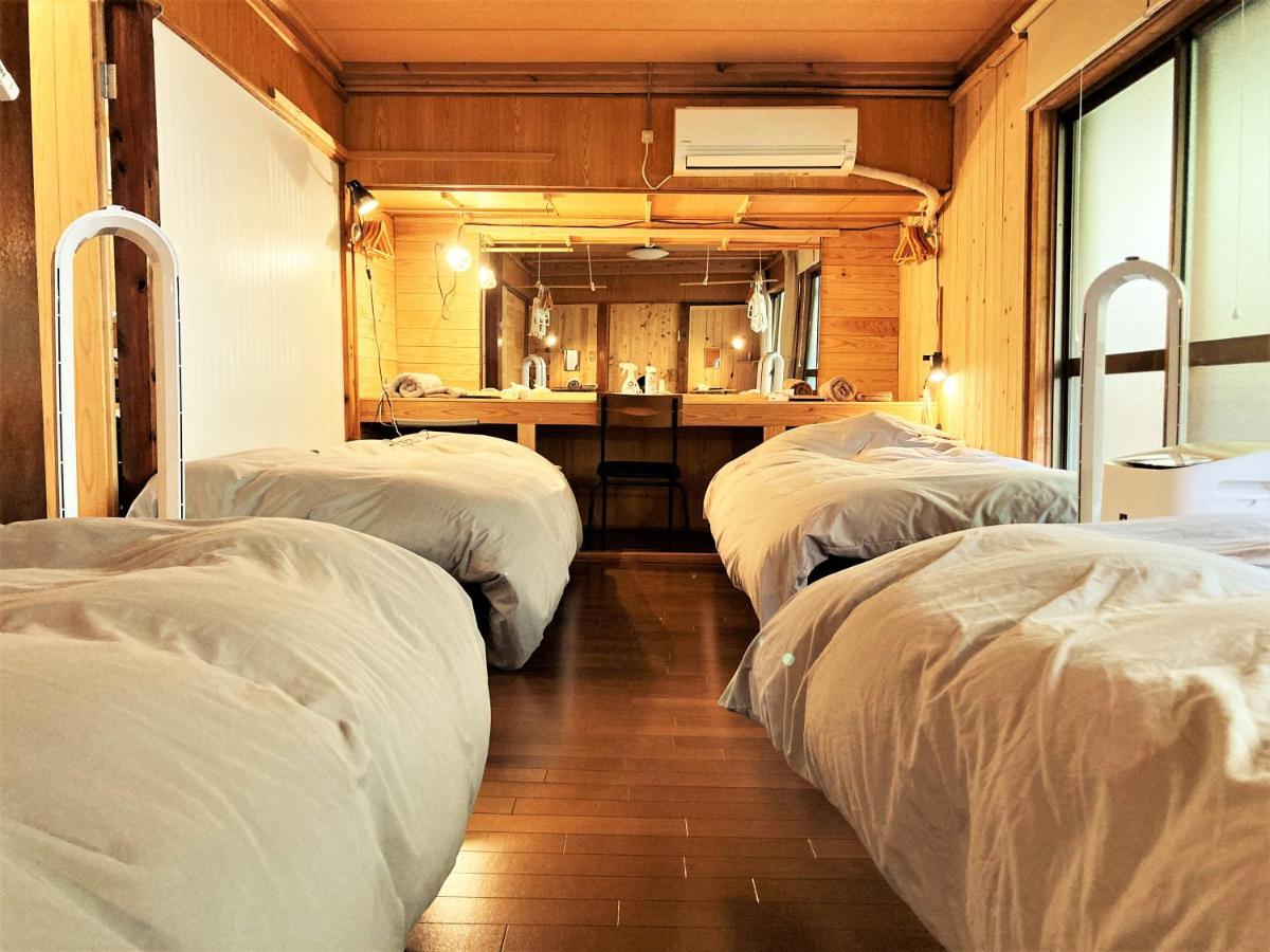 奄美ゲストハウス Hub A Nice Inn Setouchi  Экстерьер фото