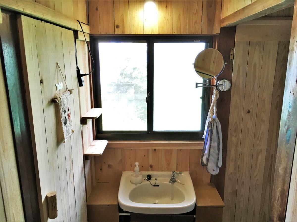 奄美ゲストハウス Hub A Nice Inn Setouchi  Экстерьер фото